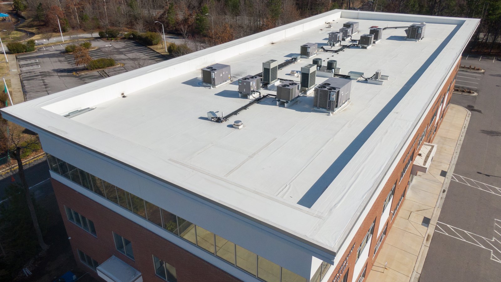 commercial roofing in Washington DC installing a TPO flat roof