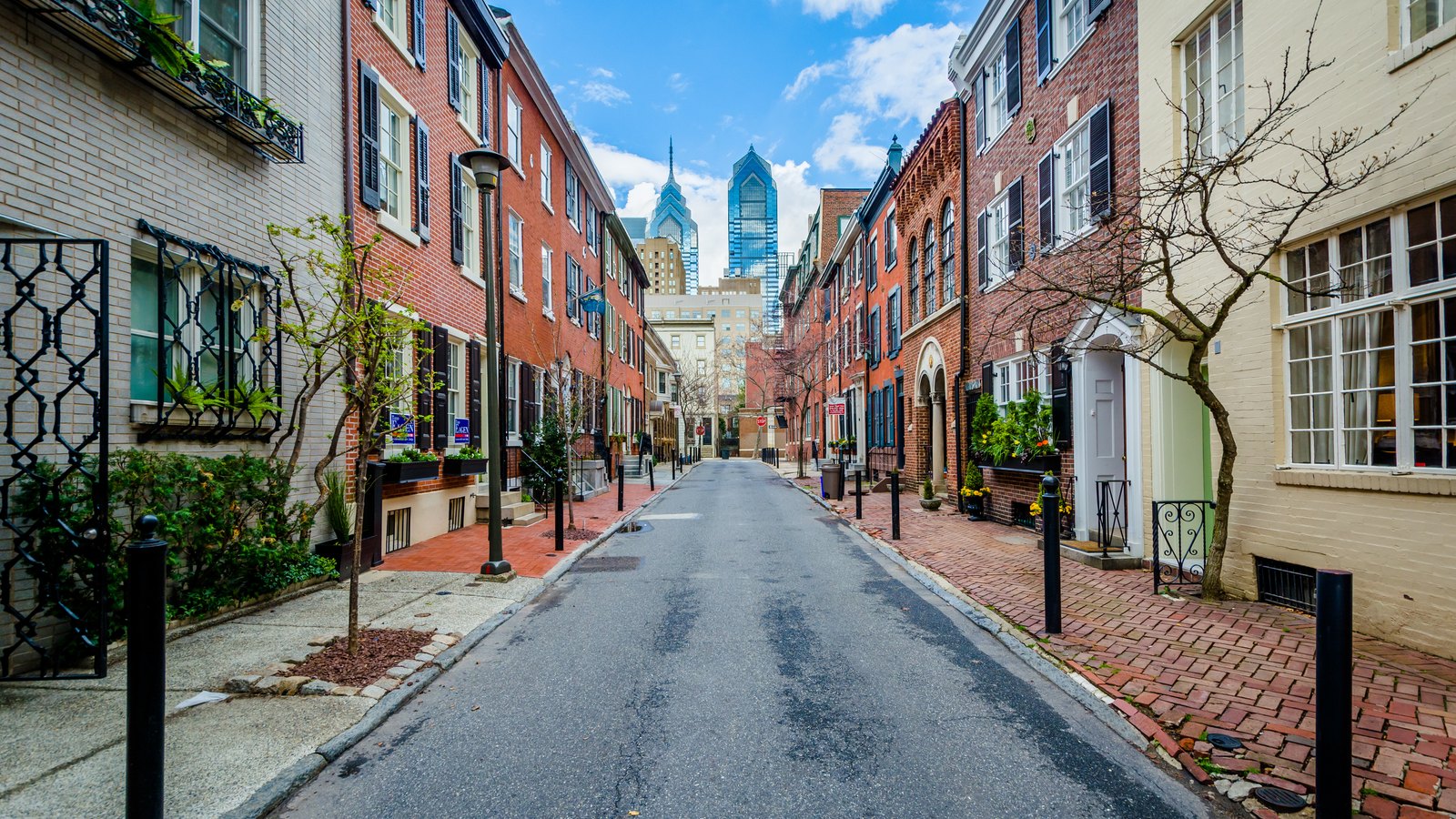 roofing in Falls Church VA on a tree-lined street